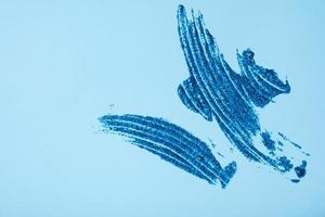 blu luccichio sbavatura su colorato sfondo superiore Visualizza. Natale luccichio elemento foto