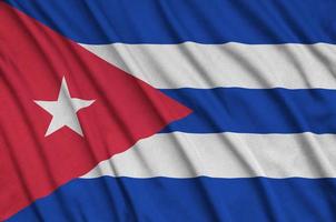 Cuba bandiera è raffigurato su un' gli sport stoffa tessuto con molti pieghe. sport squadra bandiera foto