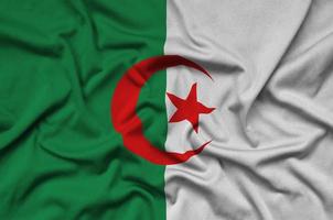algeria bandiera è raffigurato su un' gli sport stoffa tessuto con molti pieghe. sport squadra bandiera foto