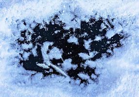 inverno o Natale sfondo con neve i fiocchi di neve primo piano, brina modelli, copia spazio foto