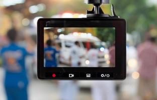 auto cctv telecamera video registratore con ambulanza auto su il strada foto