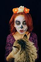giovane donna nel giorno dei morti maschera teschio viso art. foto