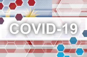 Malaysia bandiera e futuristico digitale astratto composizione con covid-19 iscrizione. coronavirus scoppio concetto foto