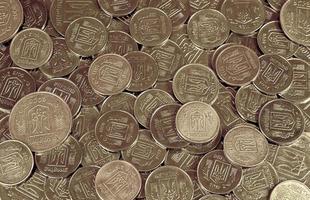 un' mucchio di monete ucraino foto