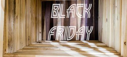 nero Venerdì rustico di legno sfondo, grande nero lettere, i saldi promozione foto