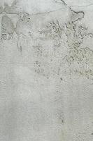 bianca stucco parete. grigio grungy dipinto cemento parete struttura foto