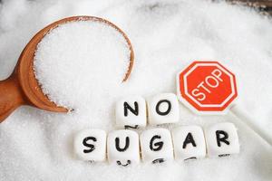 fermare, dolce granulato zucchero con testo, diabete prevenzione, dieta e peso perdita per bene Salute. foto