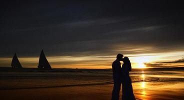 spiaggia Gli amanti a tramonto foto