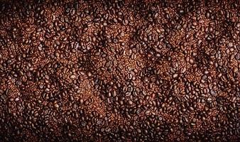 appena arrostito caffè fagioli. può essere Usato come sfondo. caffè composizione. foto