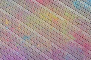 Multi colorato pavimentazione lastre, polvere rivestito con asciutto colori a il holi Festival foto