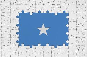 Somalia bandiera nel telaio di bianca puzzle pezzi con mancante centrale parte foto