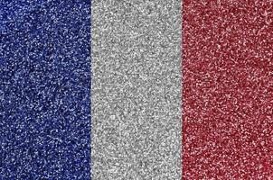 Francia bandiera raffigurato su molti piccolo brillante paillettes. colorato Festival sfondo per festa foto