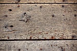 di legno superficie con vecchio metallo rivetti sfondo foto