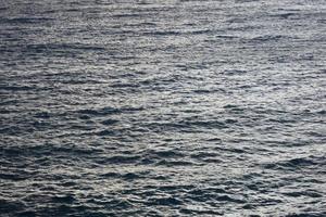 acqua di mare struttura durante il giorno foto