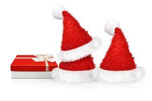 Santa Claus cappello Natale regalo su bianca sfondo. Natale, inverno, nuovo anno concetto, foto
