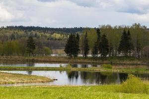 paesaggi a partire dal il lituano campagna nel primavera foto