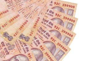 10 indiano rupie fatture bugie isolato su bianca sfondo con copia spazio impilati nel fan forma vicino su foto