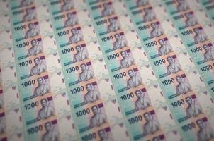 1000 indonesiano rupia fatture stampato nel illegale i soldi produzione trasportatore. collage di molti falso fatture. concetto di falsari opera foto
