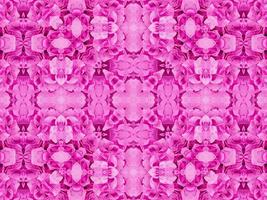 magenta floreale caleidoscopio modello. rosa fiore astratto unico e estetico sfondo foto