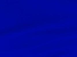 buio blu lana struttura sfondo. leggero naturale pecora lana vergine. blu senza soluzione di continuità cotone. struttura di soffice pelliccia per designer. avvicinamento frammento rosso lana tappeto.. foto