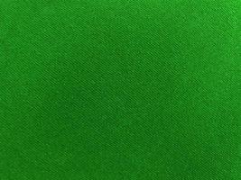 verde vecchio velluto tessuto struttura Usato come sfondo. vuoto verde tessuto sfondo di morbido e liscio tessile Materiale. Là è spazio per testo. foto