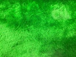verde lana tessuto struttura Usato come sfondo. vuoto blu tessuto sfondo di morbido e liscio tessile Materiale. Là è spazio per testo. foto