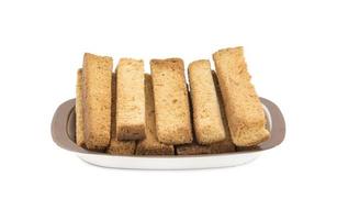 toast secchi bastoncini su un piatto da portata
