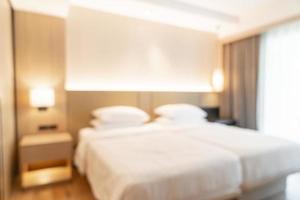 sfocatura astratta camera da letto resort hotel per lo sfondo foto