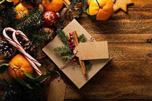 Natale sfondo con arance, caramella canne e decorazioni foto