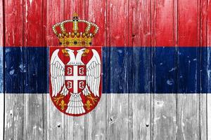 Serbia bandiera su un' strutturato sfondo. concetto collage. foto