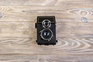 vecchio telecamera su di legno pavimento Vintage ▾ stile foto