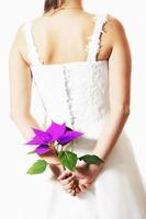 sposa con fiore foto