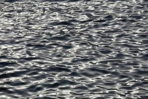 acqua di mare struttura durante il giorno foto