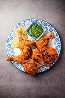 tandoori pollo è un indiano non vegetariano speziato cibo foto