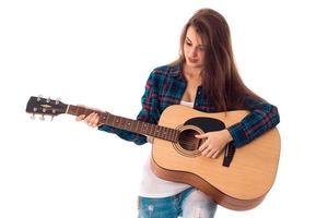 bellissimo brunetta donna con chitarra foto