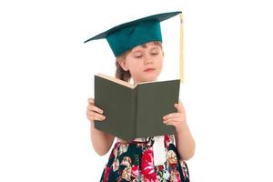 ragazza nel un' cappello con un' libro foto