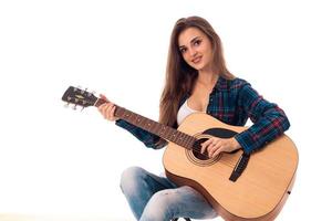 sexy ragazza con chitarra sorridente foto