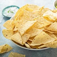 Mais tortilla patatine fritte nel un' ciotola foto