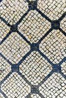 pietra mosaico su il strade di Lisbona, Portogallo. foto