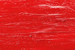 sfondo di un' sbavature rosso rossetto struttura foto