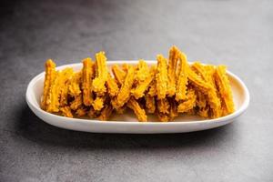 bhajni chakli bastoni o croccante Murukku merenda fatto utilizzando Diwali Festival, preferito sgranocchiare cibo foto