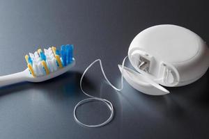 spazzolino e dentale filo foto