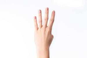 femmina mano mostrando quattro dita foto