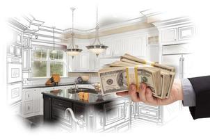 mano Tenere denaro contante al di sopra di cucina design disegno e foto combinazione