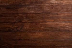 Vintage ▾ Marrone legna sfondo struttura con nodi e chiodo buchi. vecchio dipinto legna parete. Marrone astratto sfondo. Vintage ▾ di legno buio orizzontale tavole. foto