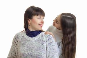 madre con figlia guardare a ogni altri nel studio foto