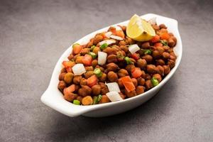 indiano strada prima colazione chana chaat anche conoscere come chana masala, cola chana chaat foto