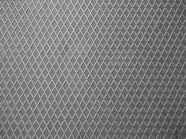 priorità bassa di struttura del metallo della maglia d'acciaio grigia foto