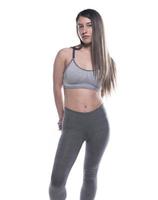 femmina fitness o aerobico istruttore con Perfetto corpo forma. isolato su bianca sfondo foto