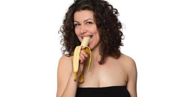 giovane donna mangiare Banana. foto